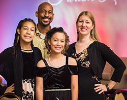 A photo of the Green family at The Forum Luncheon